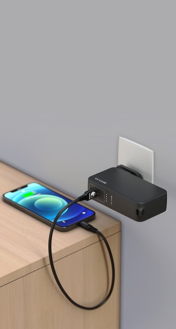Carregador Portátil Energy box carregando smartphone em cima da mesa